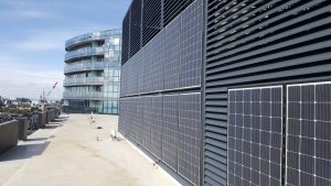 Photo of vertical solar panels at Harbour One